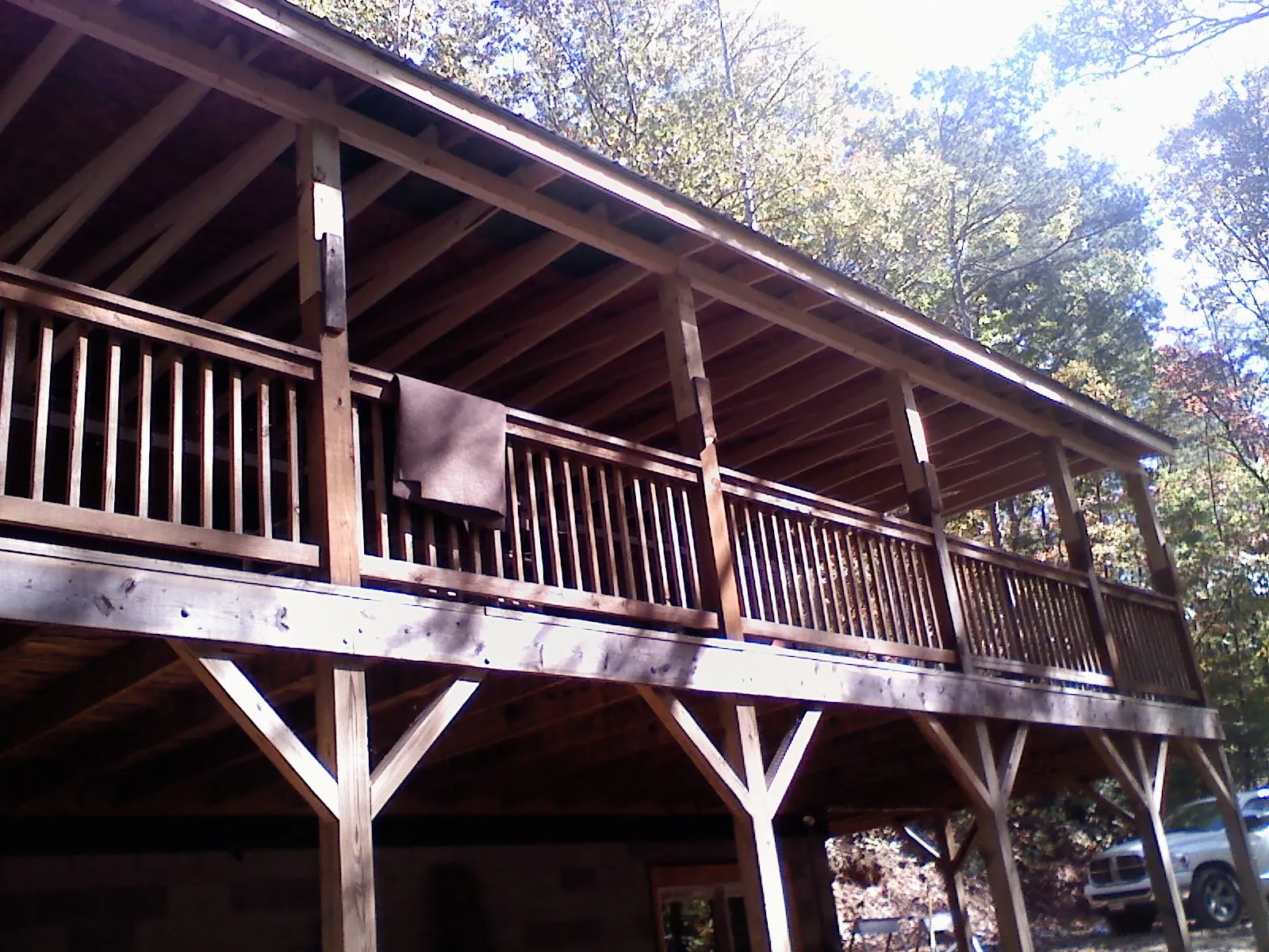 Timber framing under a new elevated porch and deck — Roof Leak Repair in Little Neck by Roofing Brothers